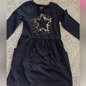 Black dress with gold sparkly star, size 4/5